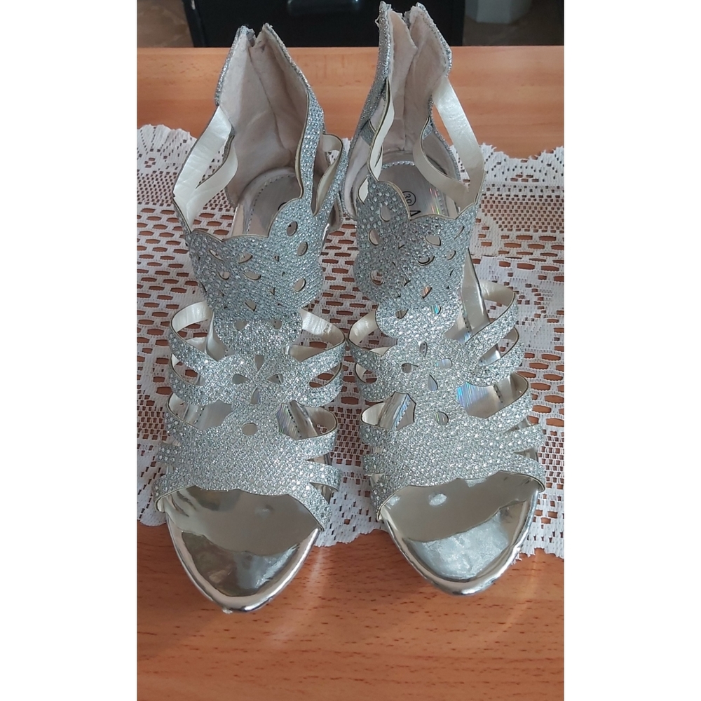 Women Silver Shoes from a company call "Action"
